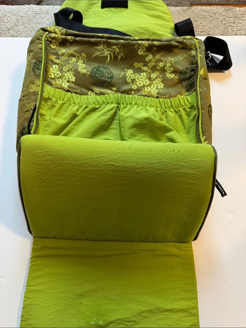 Petunia Pickle Bottom olive and lime floral crossbody diaperbag